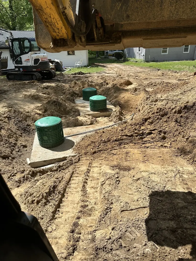 adept septic services installing a new septic tank